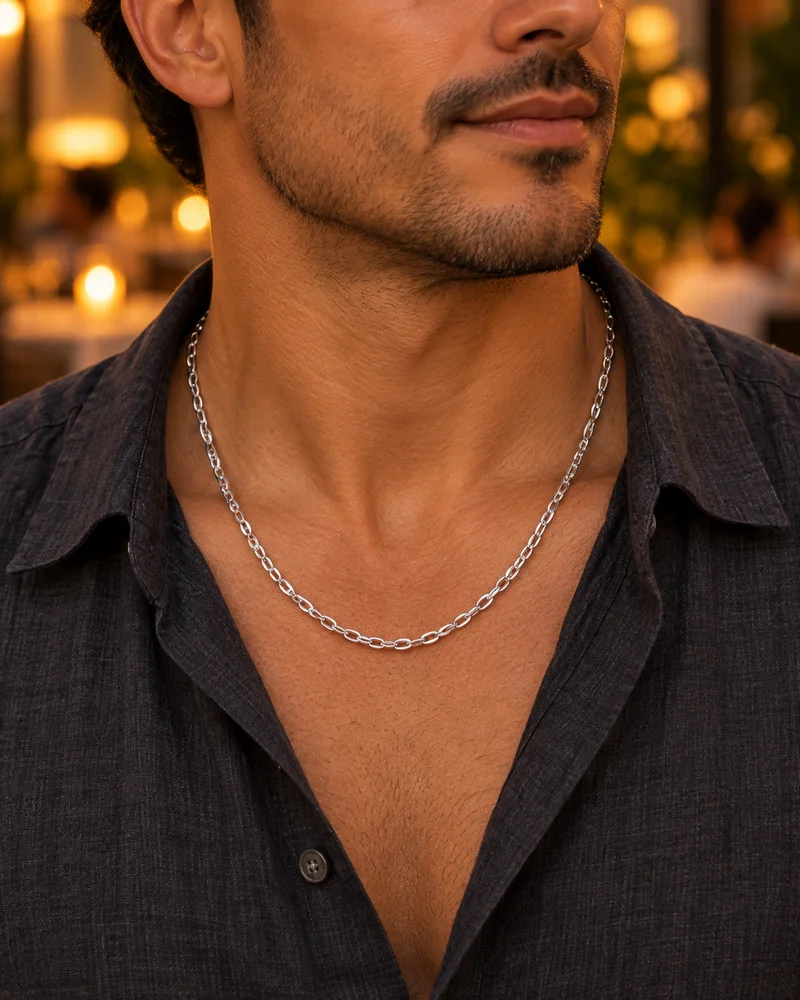 3.4 mm silver French cable chain worn naturally in an evening look